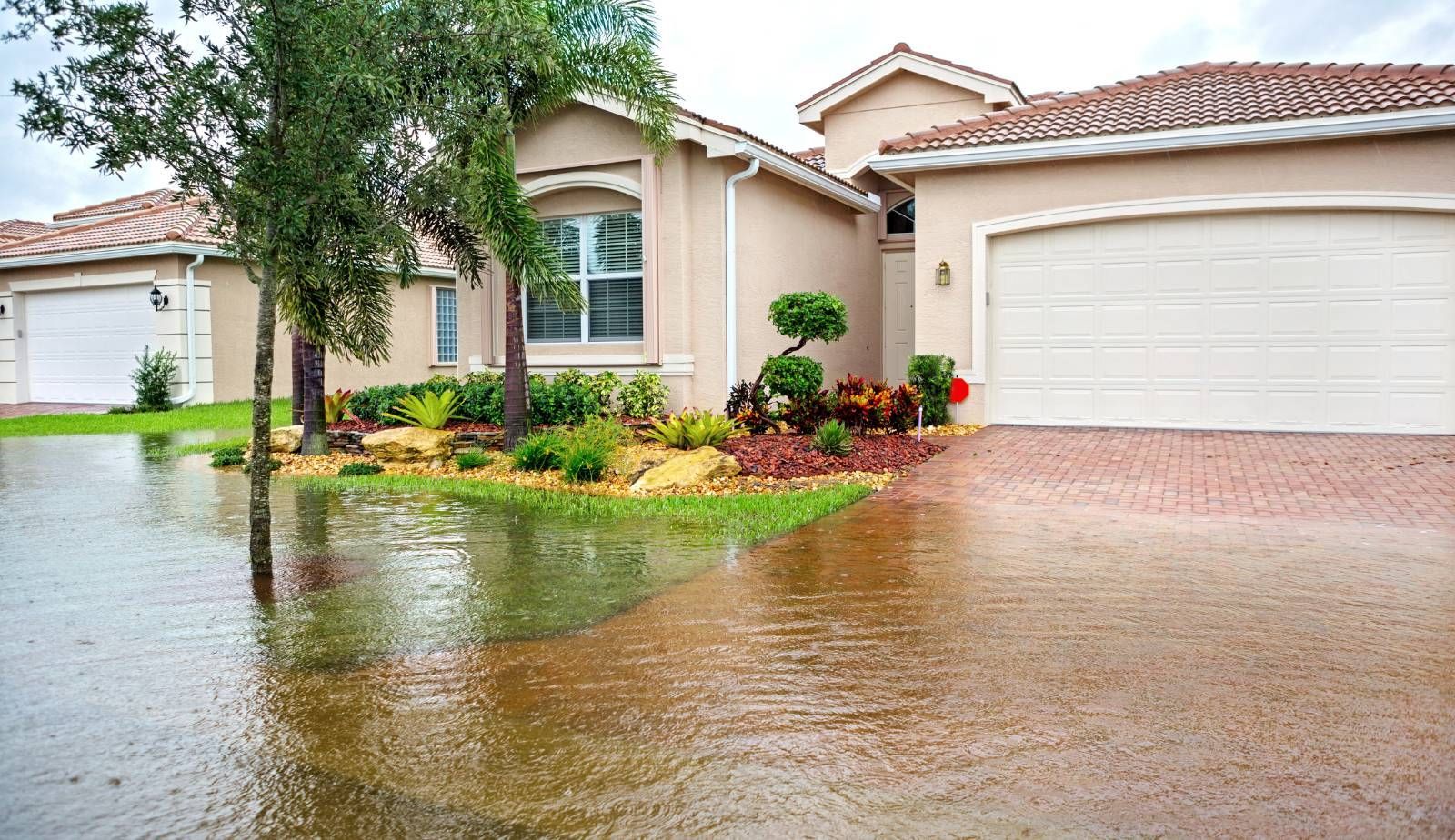 Flooded residential street in Louisiana after a major storm.
