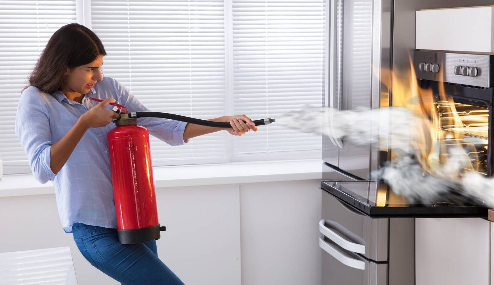 Faint smoke still hanging in the air inside a residential living room, illustrating the need for air purification and deodorization after a fire.