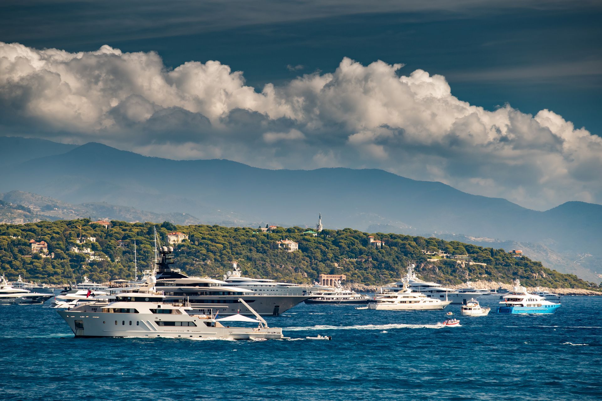 collection of superyachts moored outside Port Hercules, Monaco