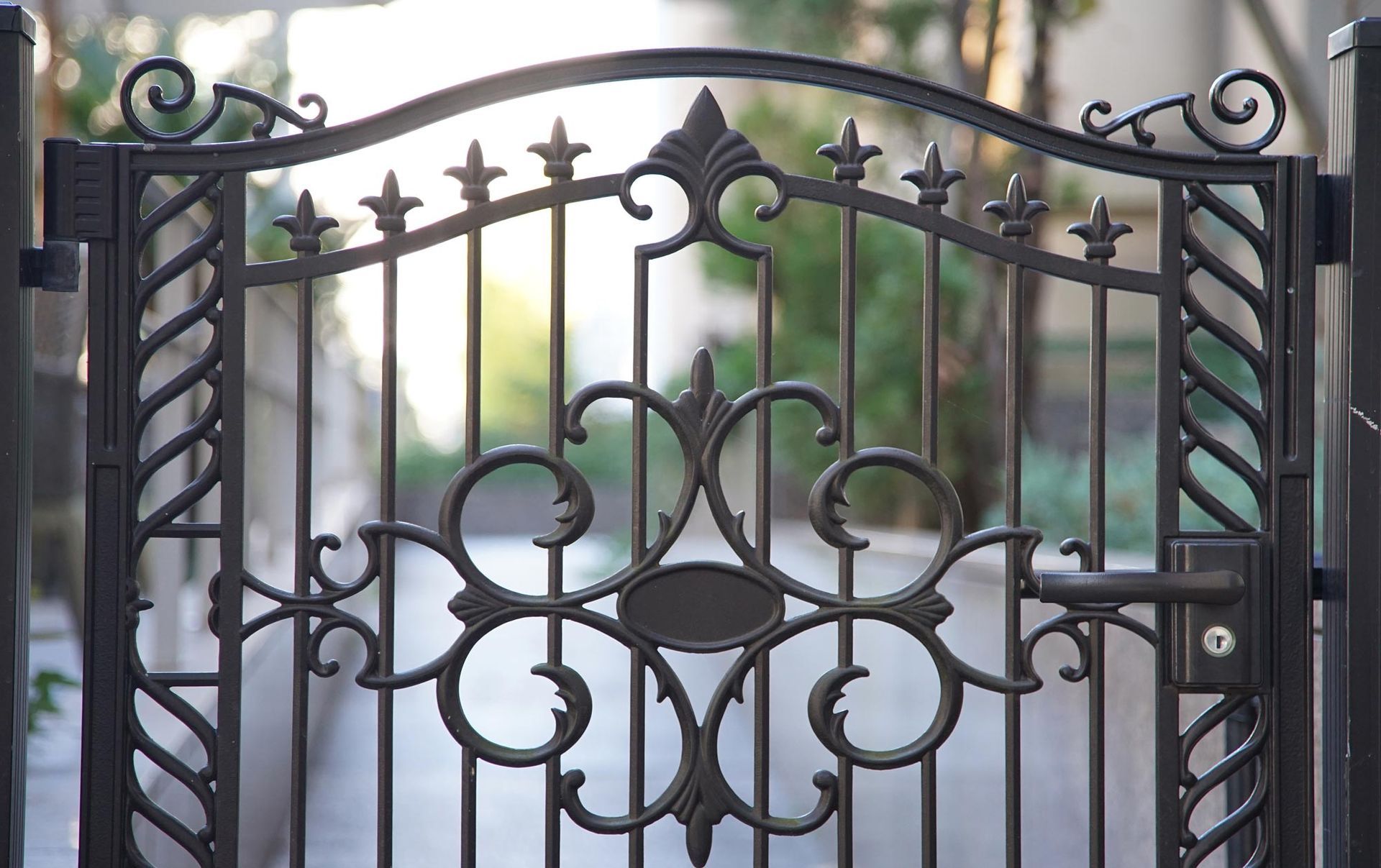 A Close up Of a Wrought Iron Gate on A Sidewalk | Cranbourne, VIC | Cranbourne Fencing Pty Ltd