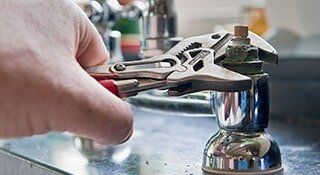 Repairing Faucet — Plumbing in Oakland Pard, FL