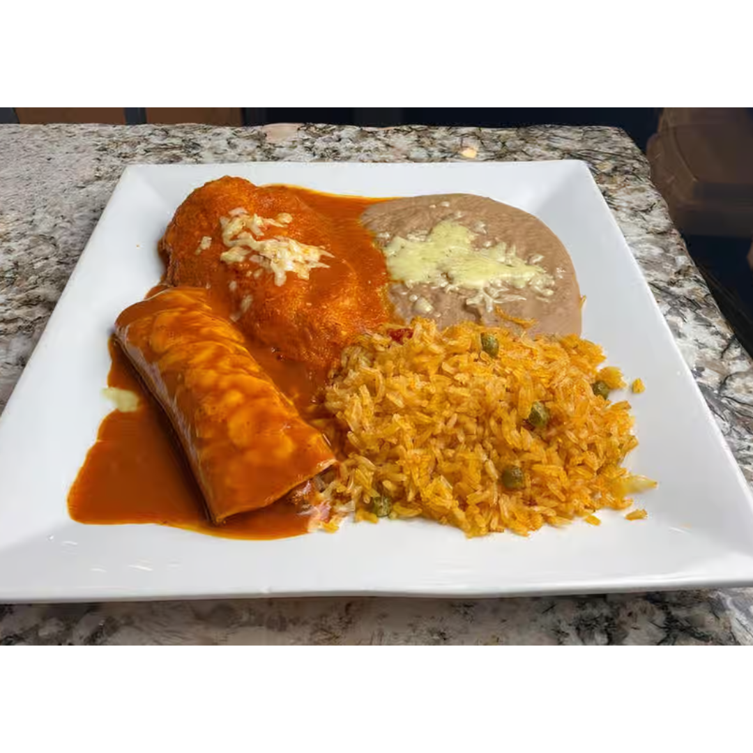 A plate of mexican food with rice and beans on a table.