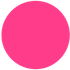 Bright pink circle on a white background.