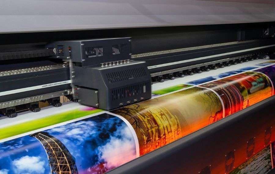 Large format printer printing a colorful panorama.