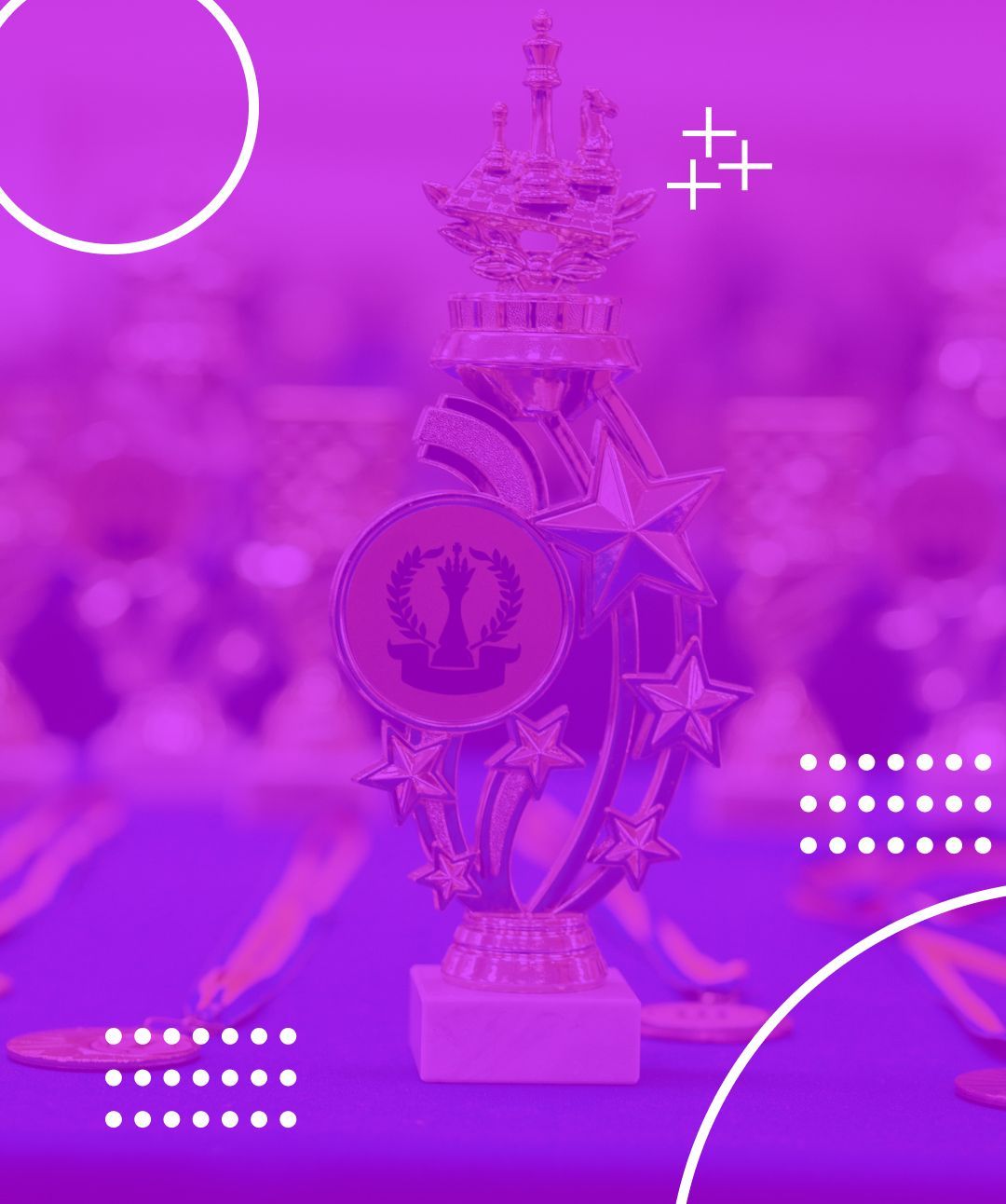 A large trophy with a crown and stars; purple background with other trophies and decorations.