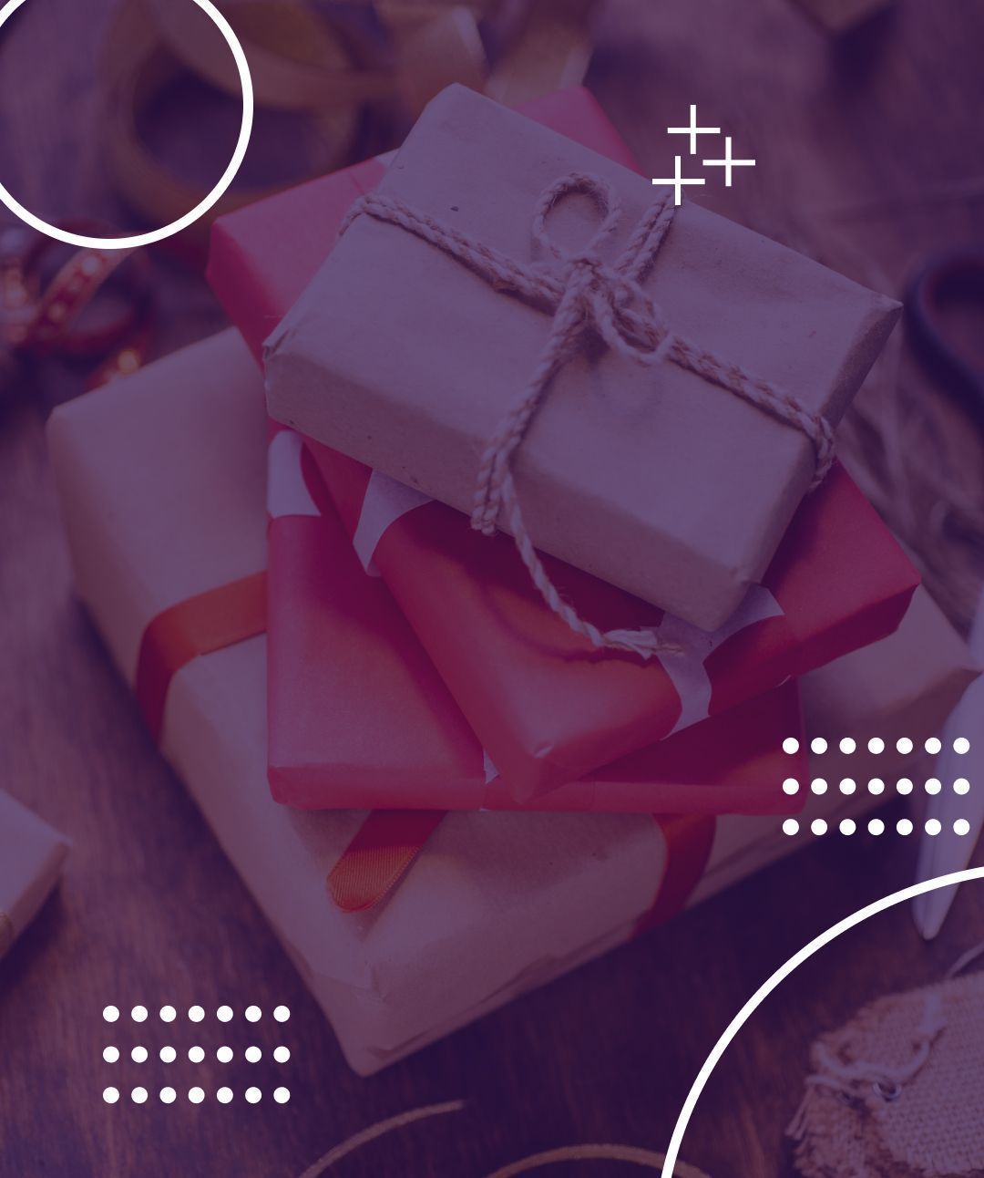 Pile of wrapped gifts, primarily pink and tan, with twine and ribbon.