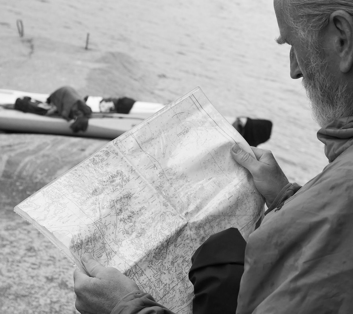 Erik checking the map during a kayak trip in Gryt archipelago, Sweden