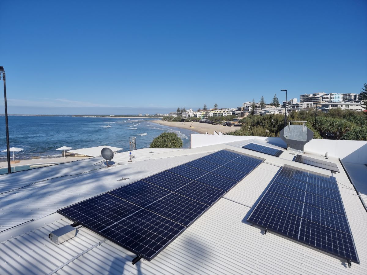 Man Repairing White Roof