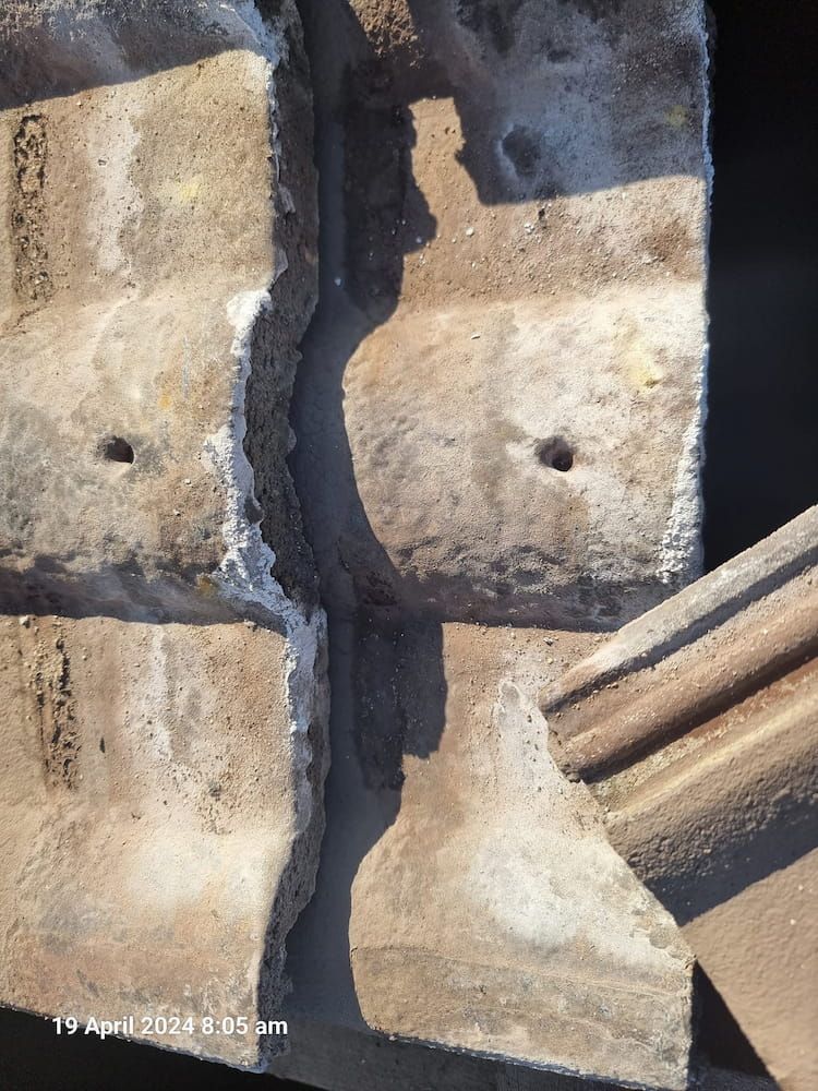 A Close Up of a Piece of Concrete With a Hole in It — Stormguard Roofing In Noosa, QLD