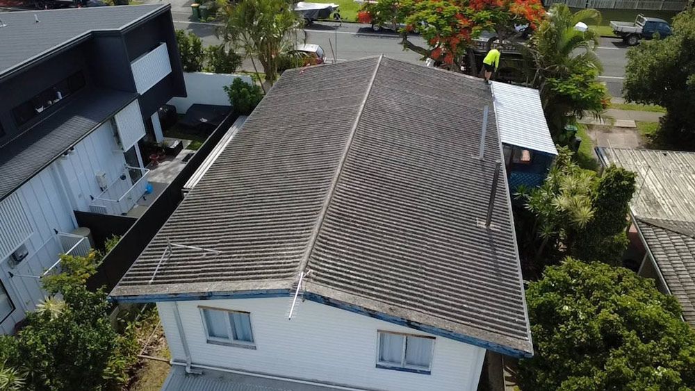 Man Checking Hidden Damages on Roof