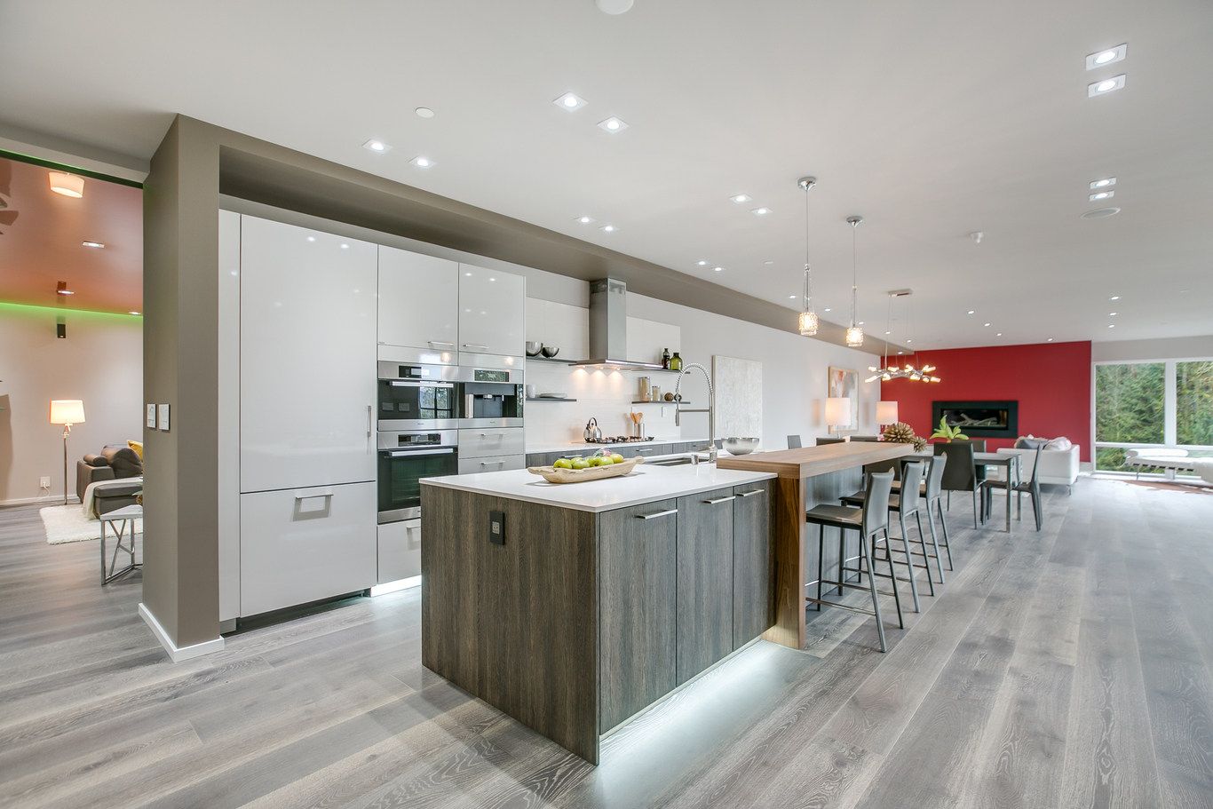 There is a large island in the middle of the kitchen.