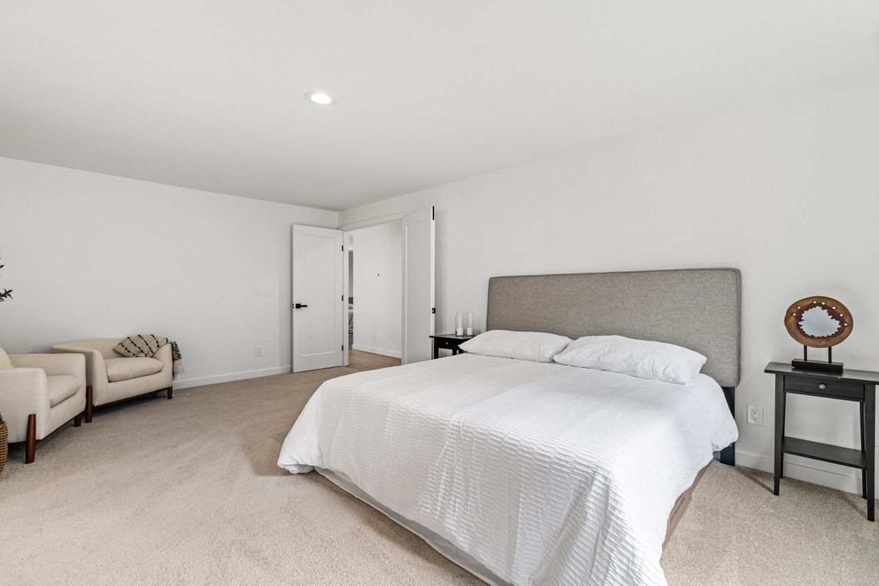 There is a large bed in the middle of the room.