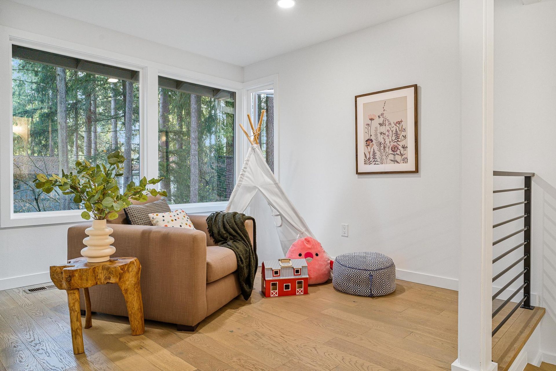 There is a teepee in the middle of the room.