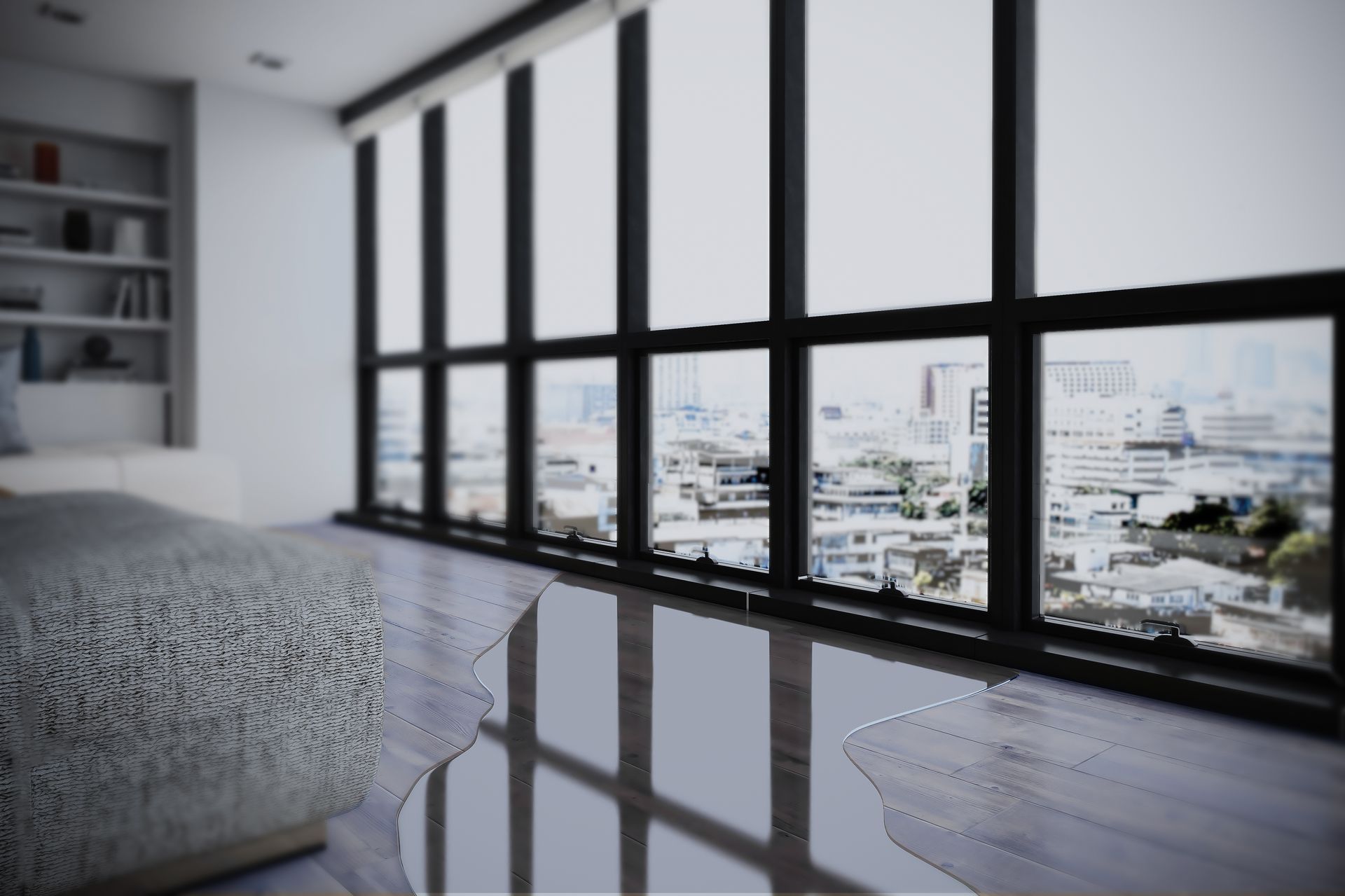 A room with a lot of windows and a puddle of water on the floor