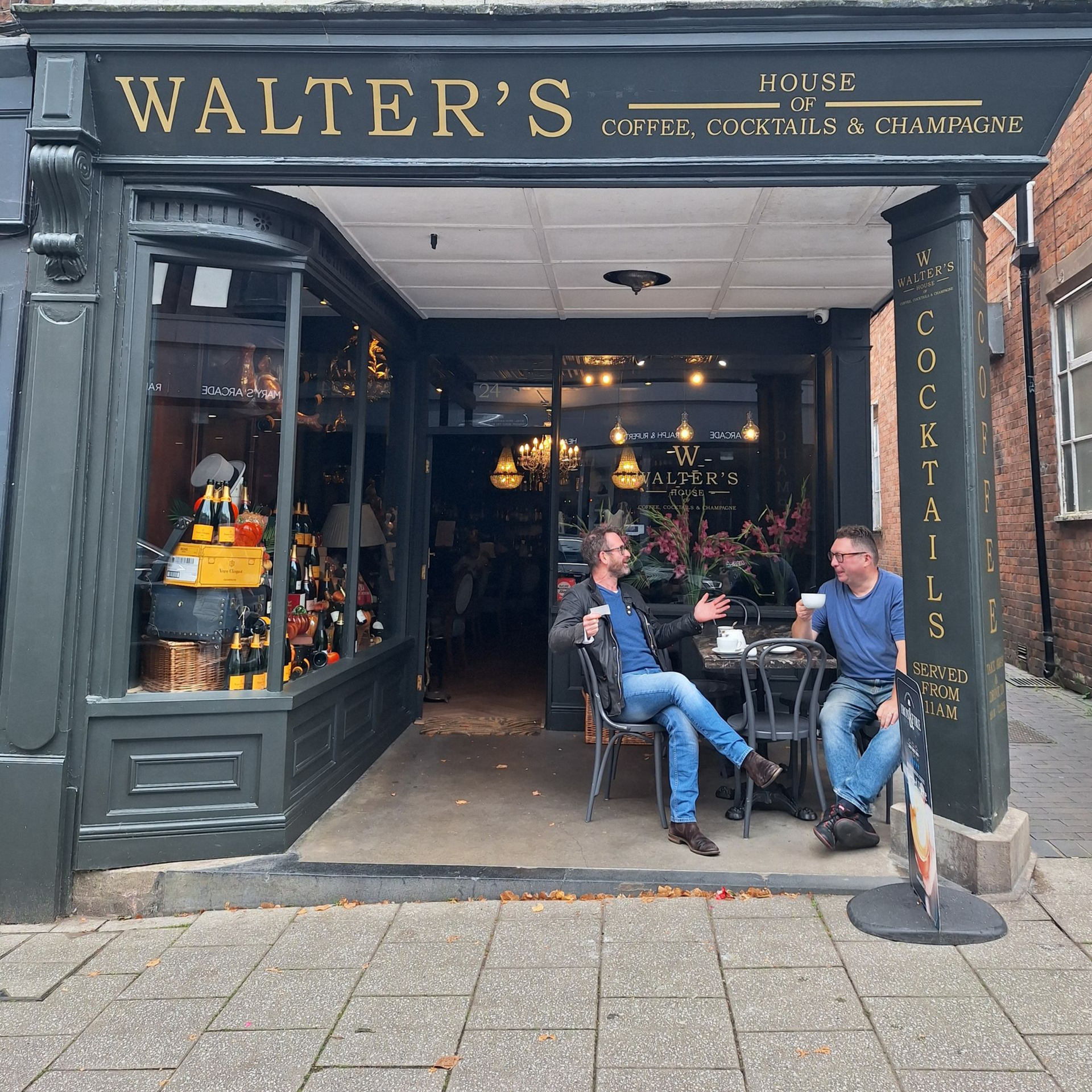 Walter's Wine bar & coffee shop with two people drinking coffee