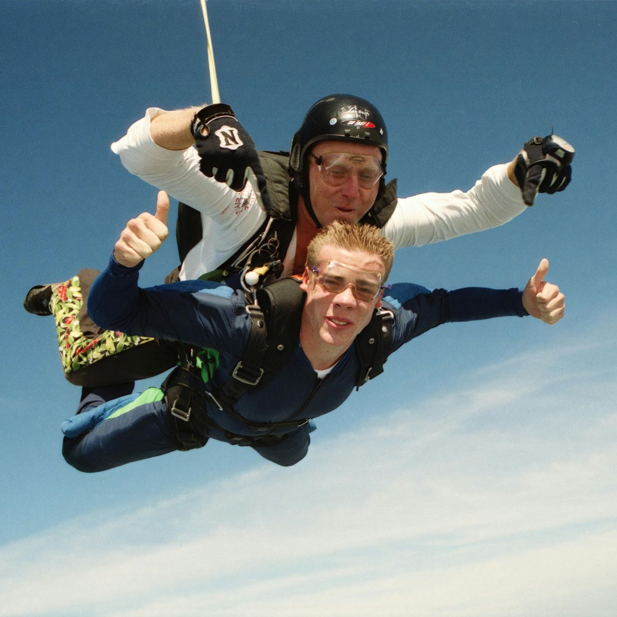 two people sky diving