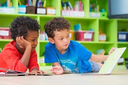 Nursery Schools — Children Browsing Textbook in Lake Charles, LA