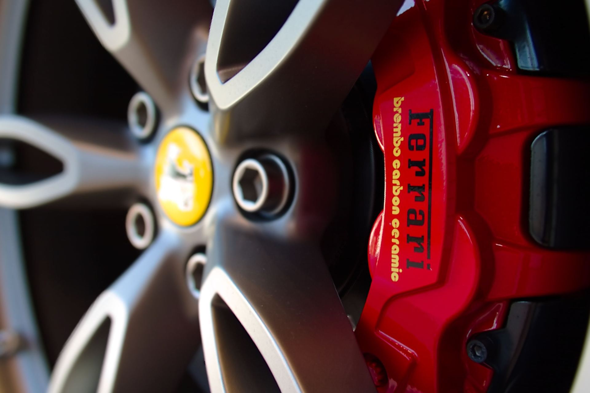 red Ferrari brake calliper