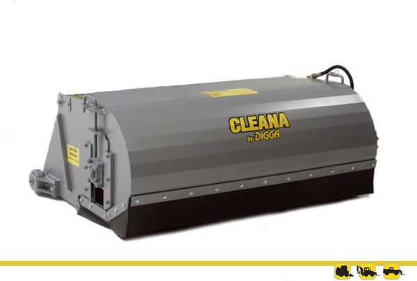 A cleana broom is sitting on a white surface.