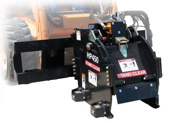 A machine that says hp450 on it is attached to a forklift.