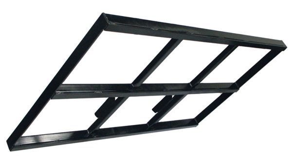 A black metal frame is sitting on a white surface.