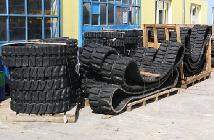 A bunch of tires are stacked on top of each other