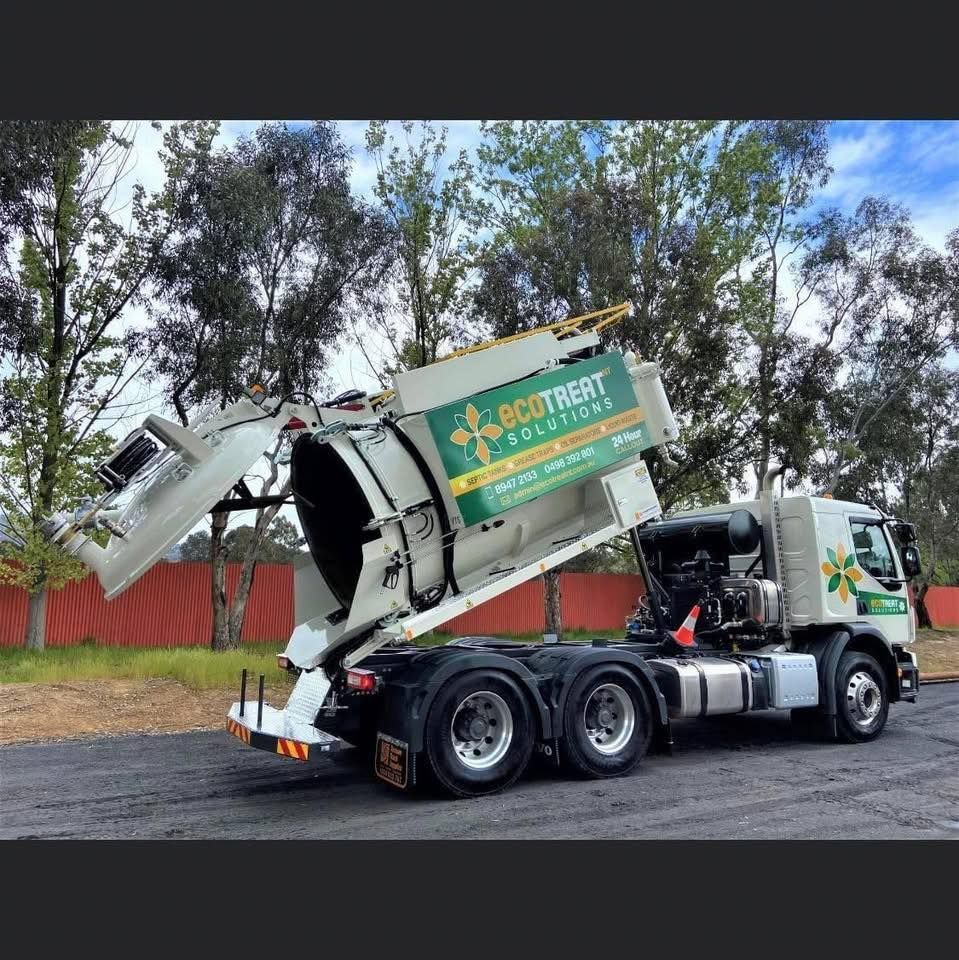 A Vacuum Truck is Parked on the Side of the Road — Ecotreat Solutions NT in Winnellie, NT