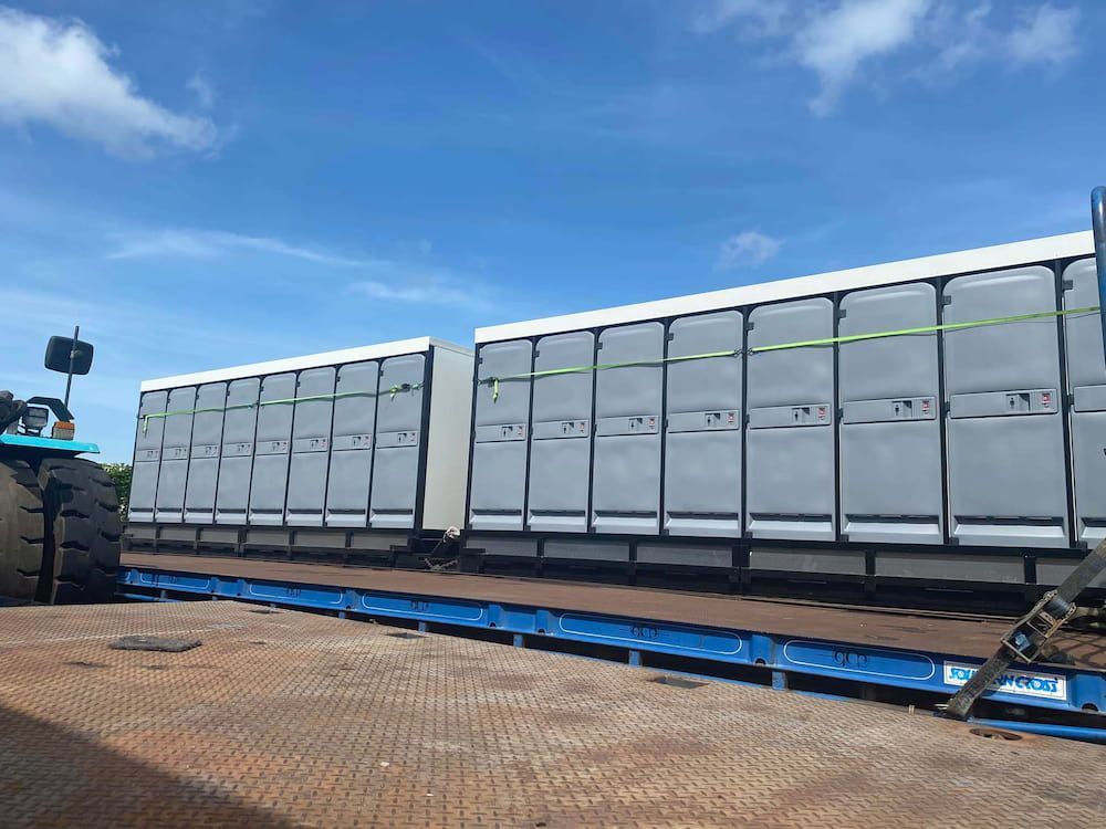 A Large Train Car is Sitting on Top of a Scale — Ecotreat Solutions NT in Darwin Rural, NT