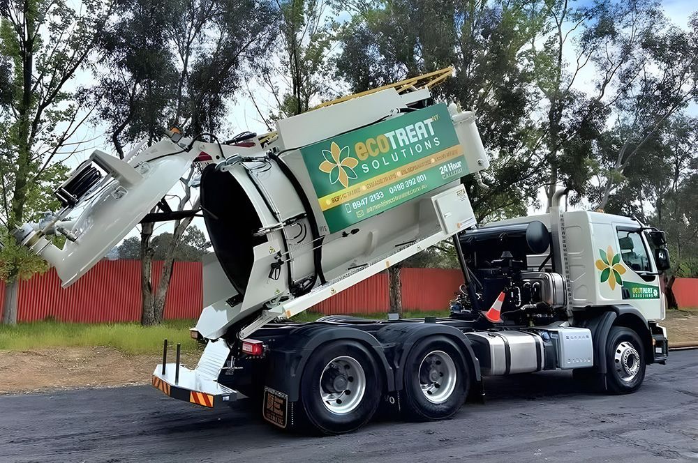 EcoTreat Solutions Truck with Open Container