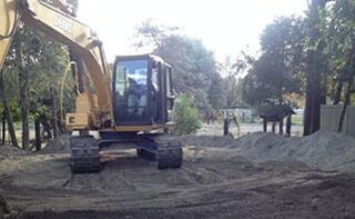 Backhoe Excavating Land — Oil tank services in Paterson, NJ
