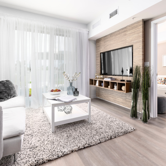 A living room with a couch and a coffee table