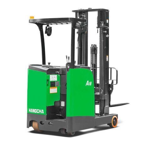 Green and black stand-up forklift, with forks extended.