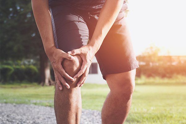 Man Suffering Knee Injury — Cheyenne, WY — Northview Medical