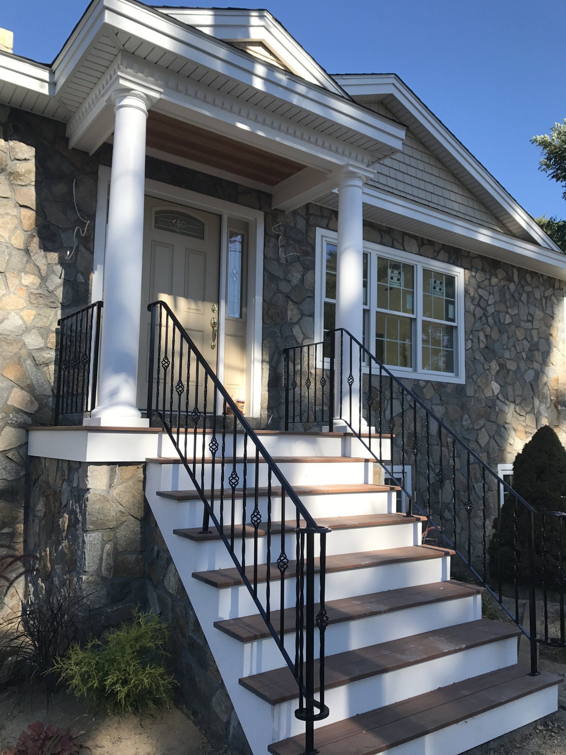 Metal railing around house in Southern New Hampshire