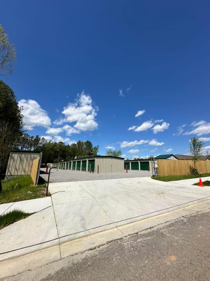 A parking lot with a lot of storage units in it