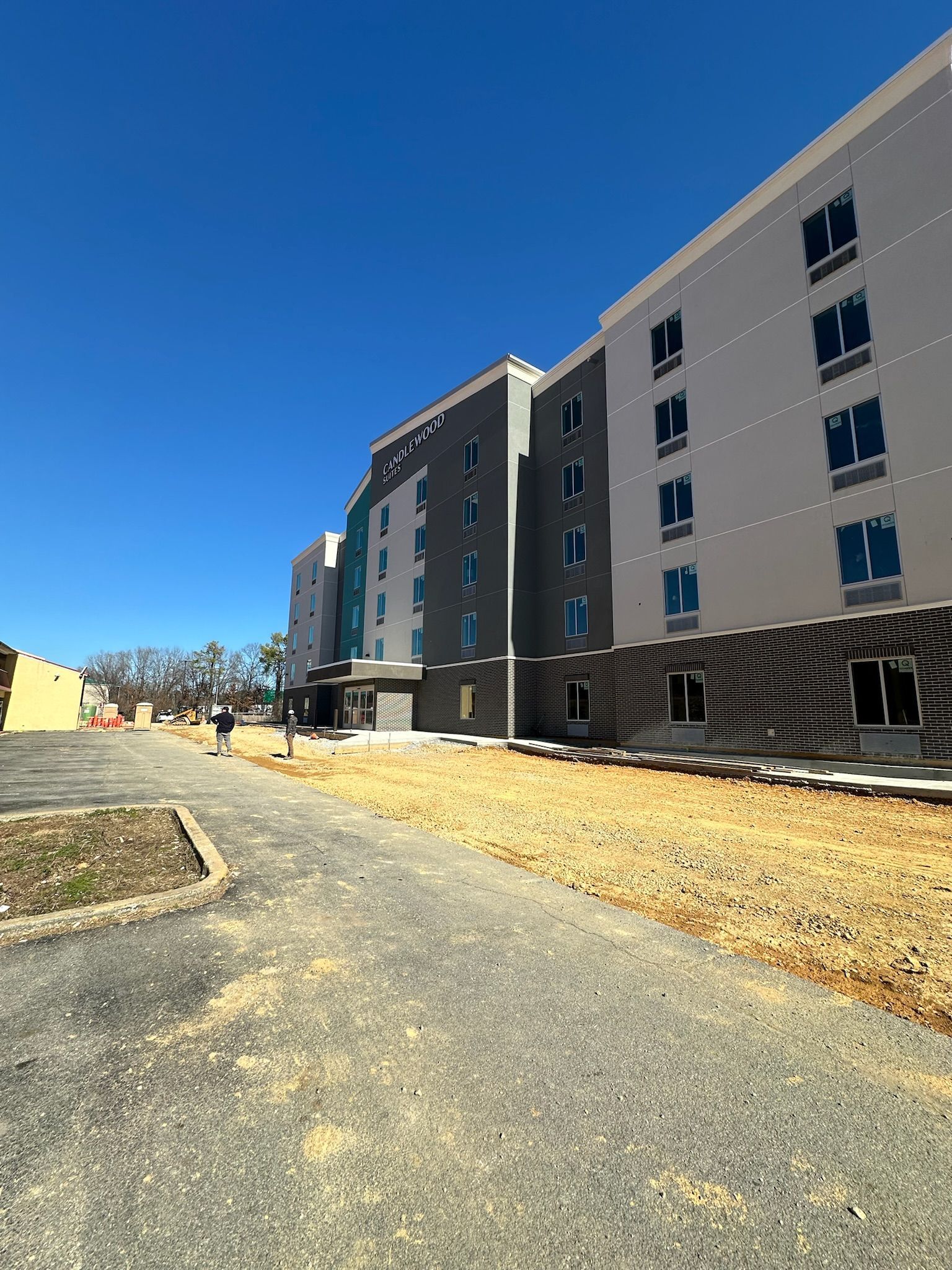 A large building with a lot of windows is being built.