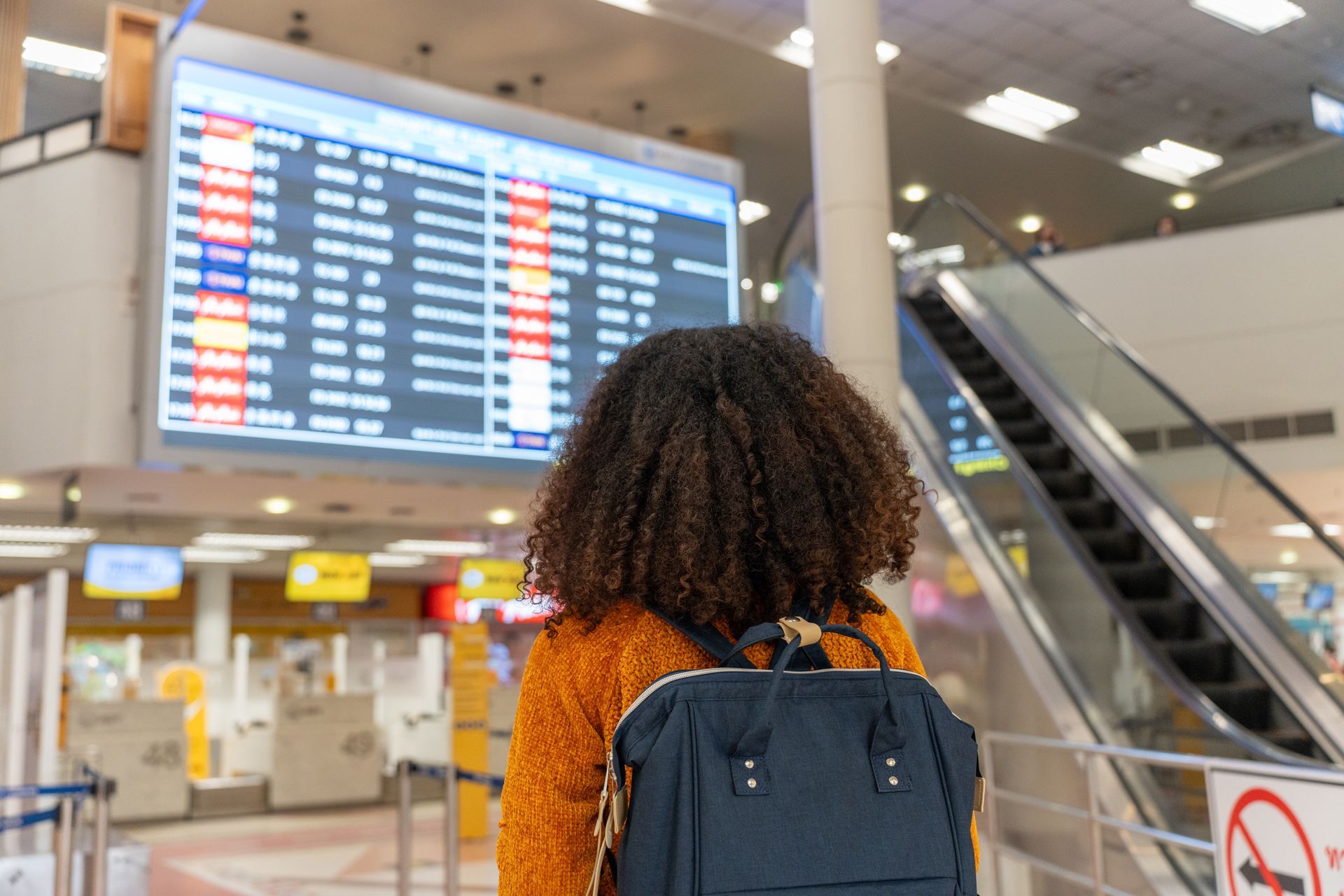 black woman travel in the airport