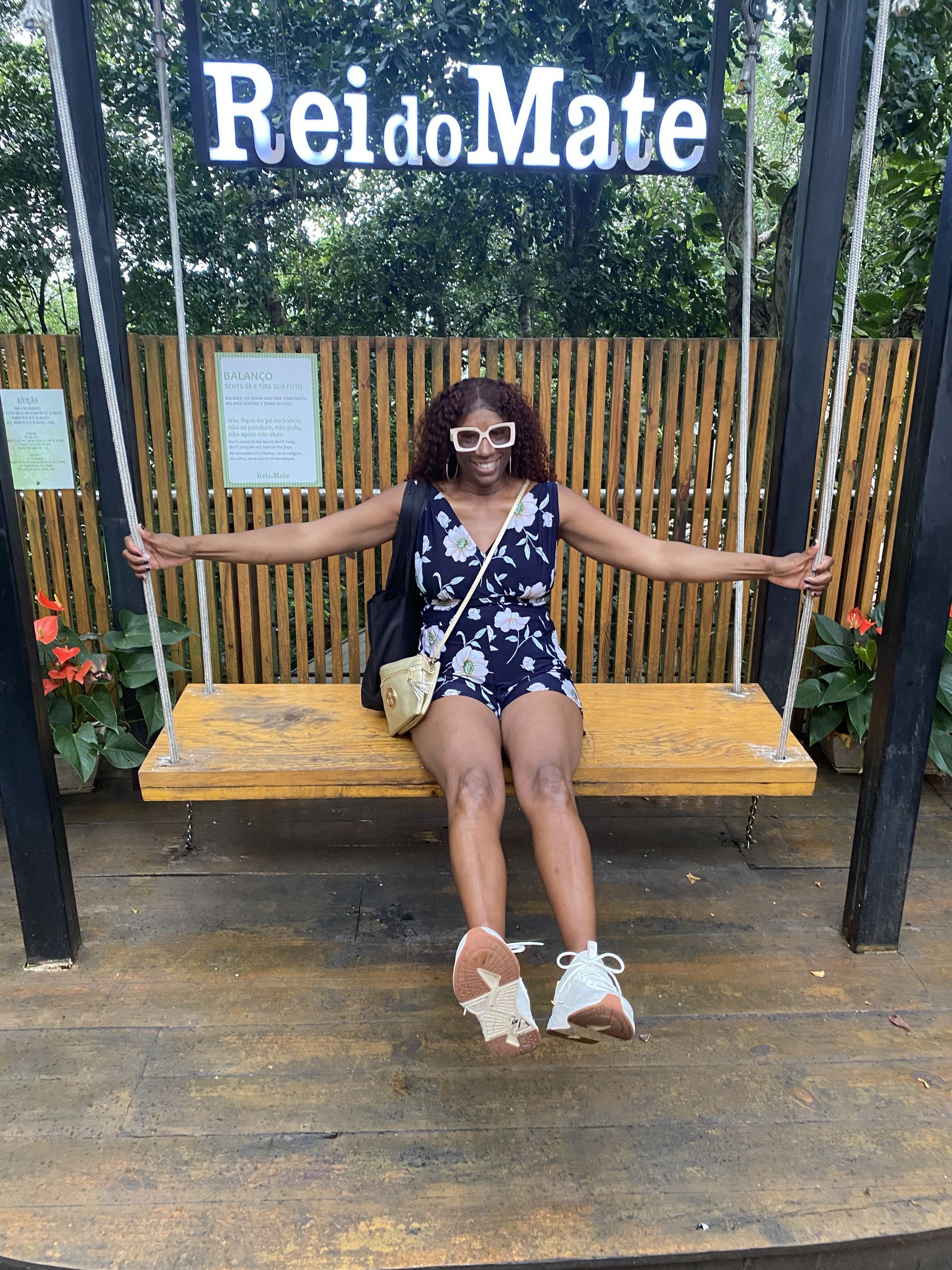 Enjoying the swing at a cafe on Sugarloaf Mountain in Brazil