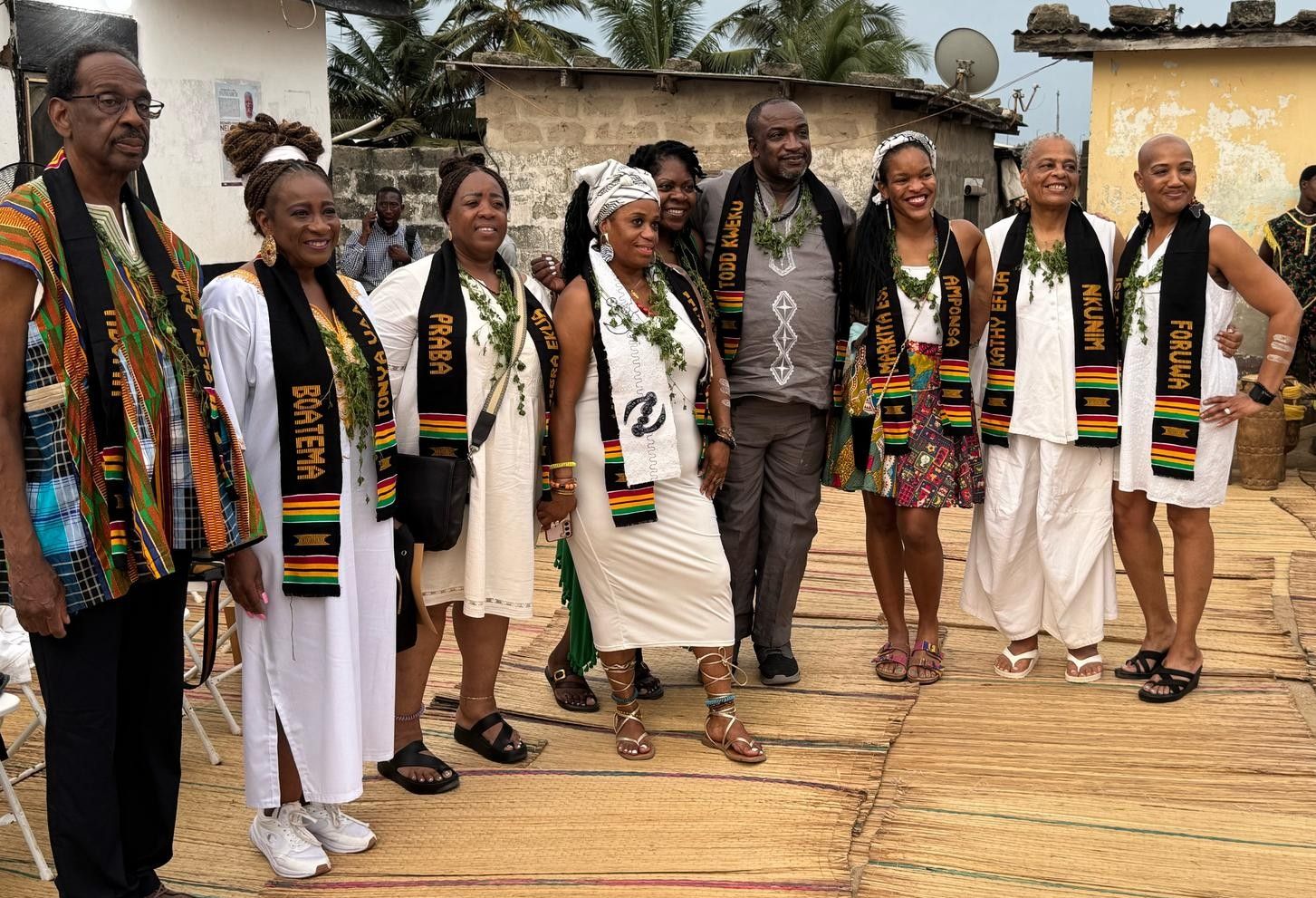 black travel group enjoy a naming ceremony in Ghana