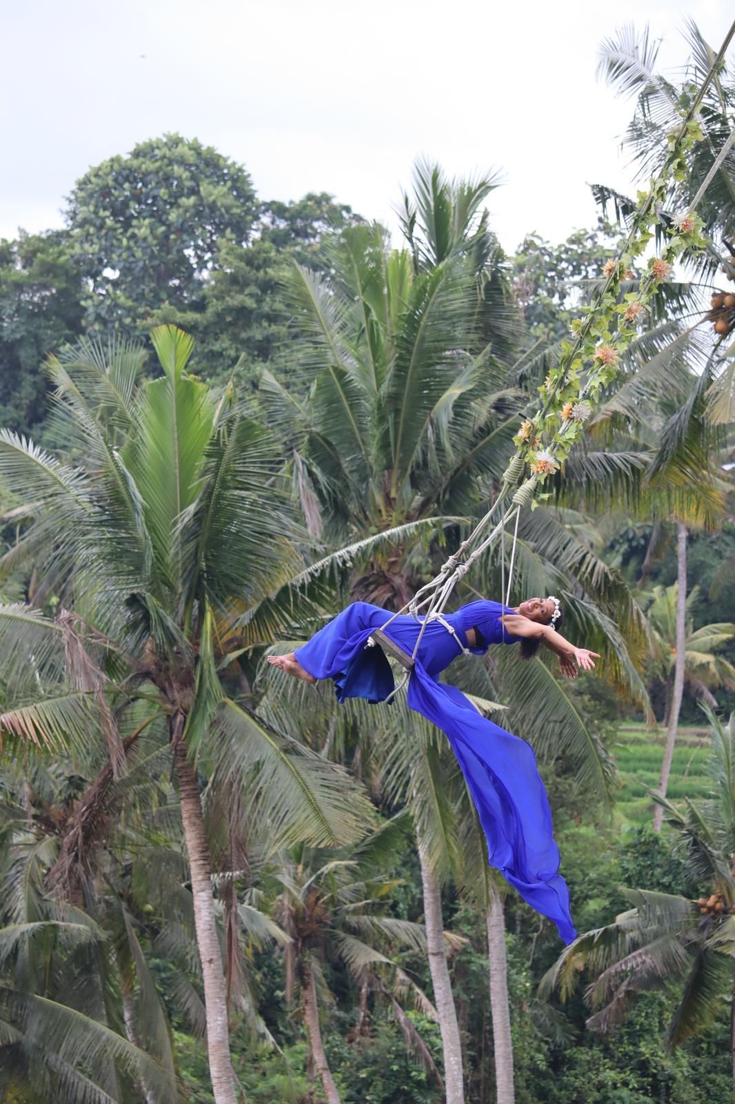 black woman enjoying the swing in Bali