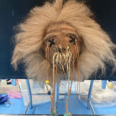 A Close Up of a Native American Mask on a Table — La Bomba Loca Tattoo in Cairns City, QLD