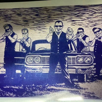 A Black and White Drawing of a Group of Men Standing Around a Car — La Bomba Loca Tattoo in Cairns City, QLD
