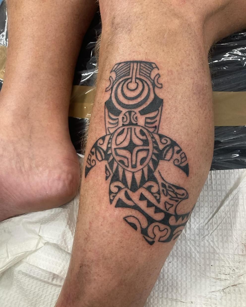 A Man Has a Tattoo of a Turtle on His Leg — La Bomba Loca Tattoo in Smithfield, QLD