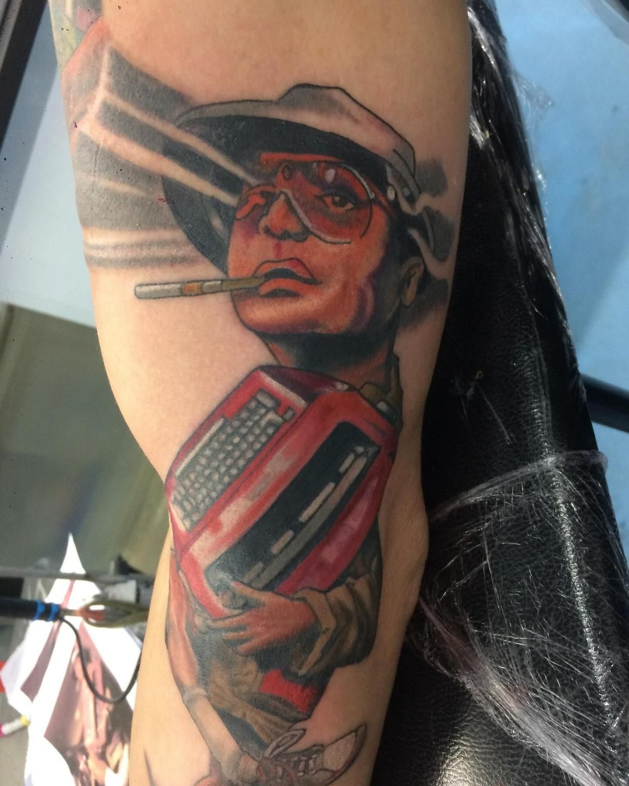 A Tattoo on a Person's Arm Featuring a Stylized Portrait — La Bomba Loca Tattoo in Edmonton, QLD