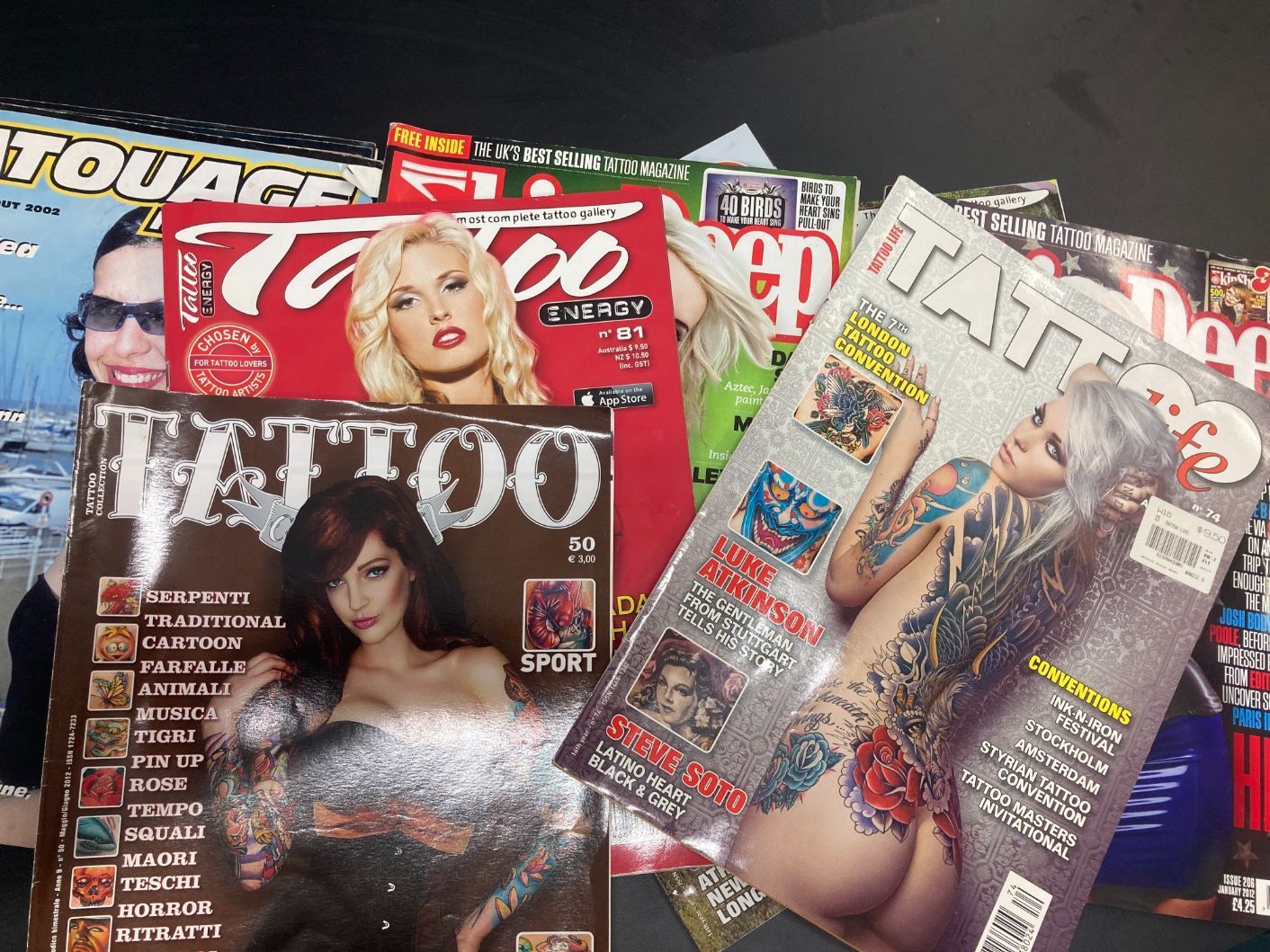 Bunch Of Tattoo Magazines — La Bomba Loca Tattoo in Cairns City, QLD