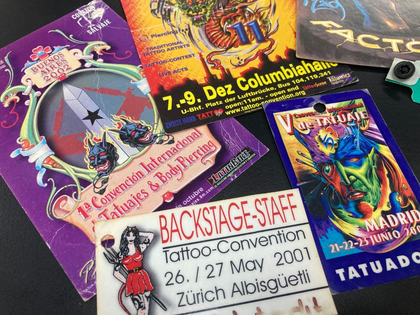 A Bunch of Flyers Including One That Says Backstage Staff — La Bomba Loca Tattoo in Cairns City, QLD