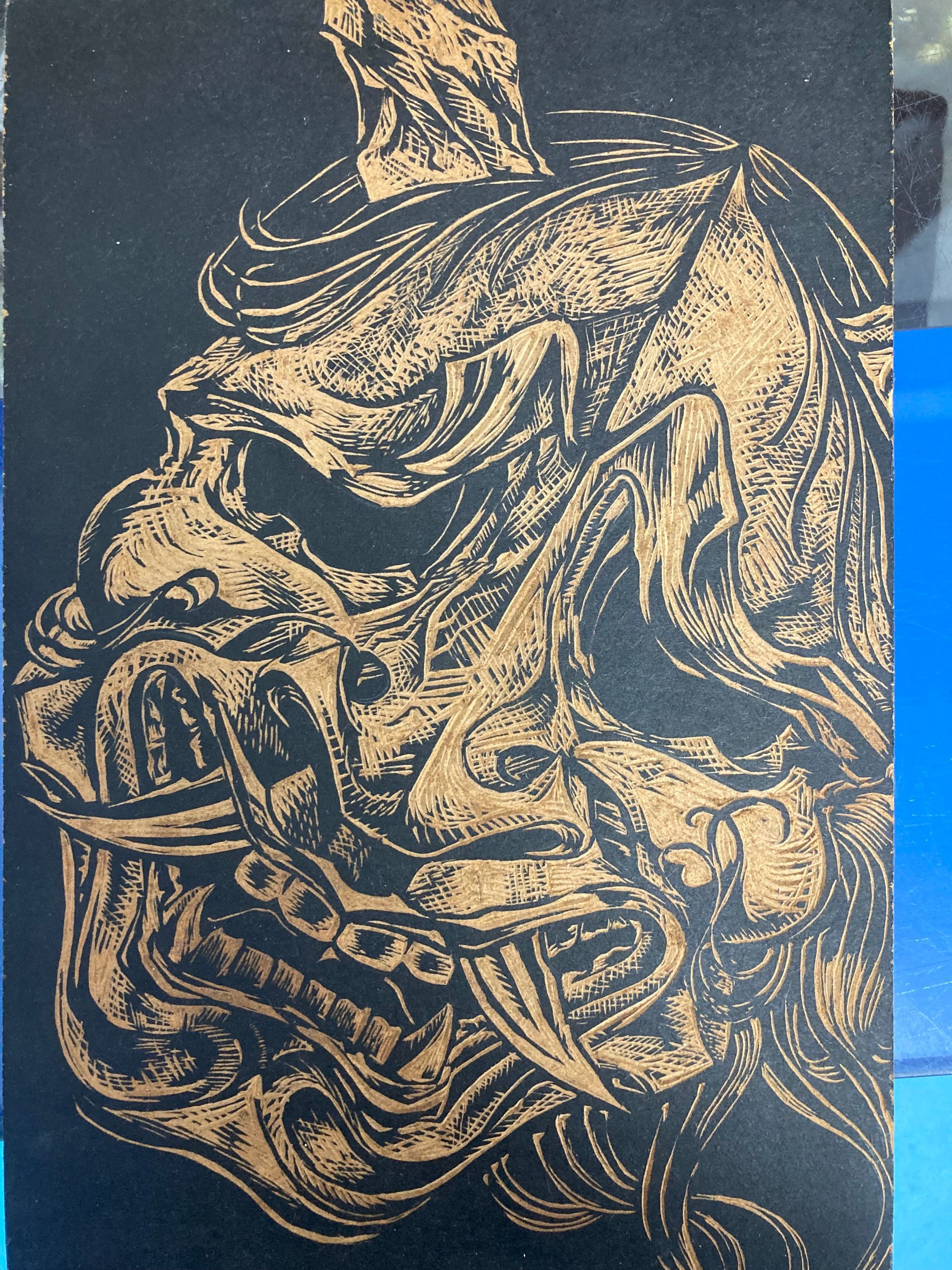 A Black and Gold Drawing of a Monster With the Letters Dc on It — La Bomba Loca Tattoo in Cairns City, QLD