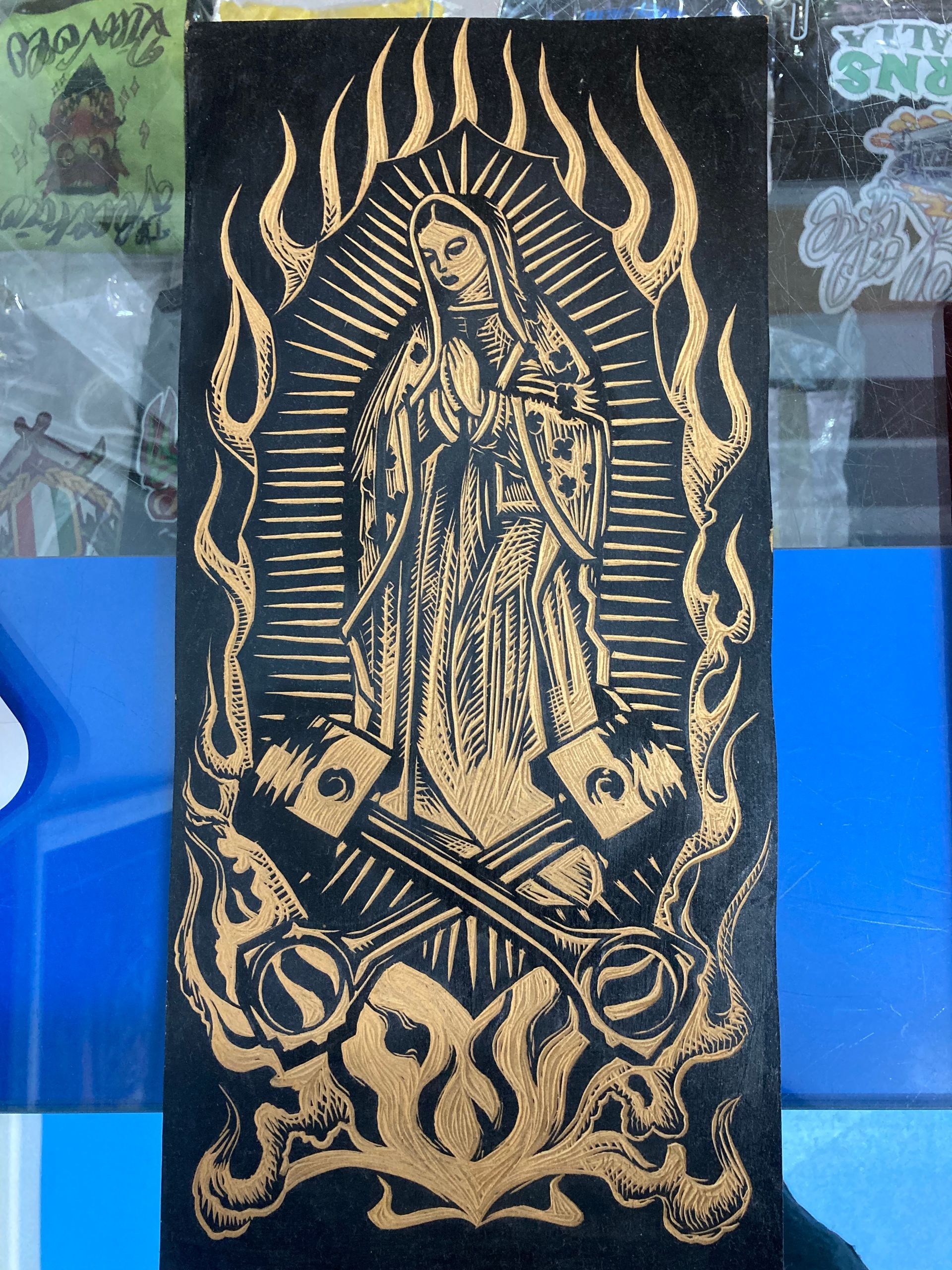 A Black and Gold Painting of the Virgin Mary — La Bomba Loca Tattoo in Cairns City, QLD
