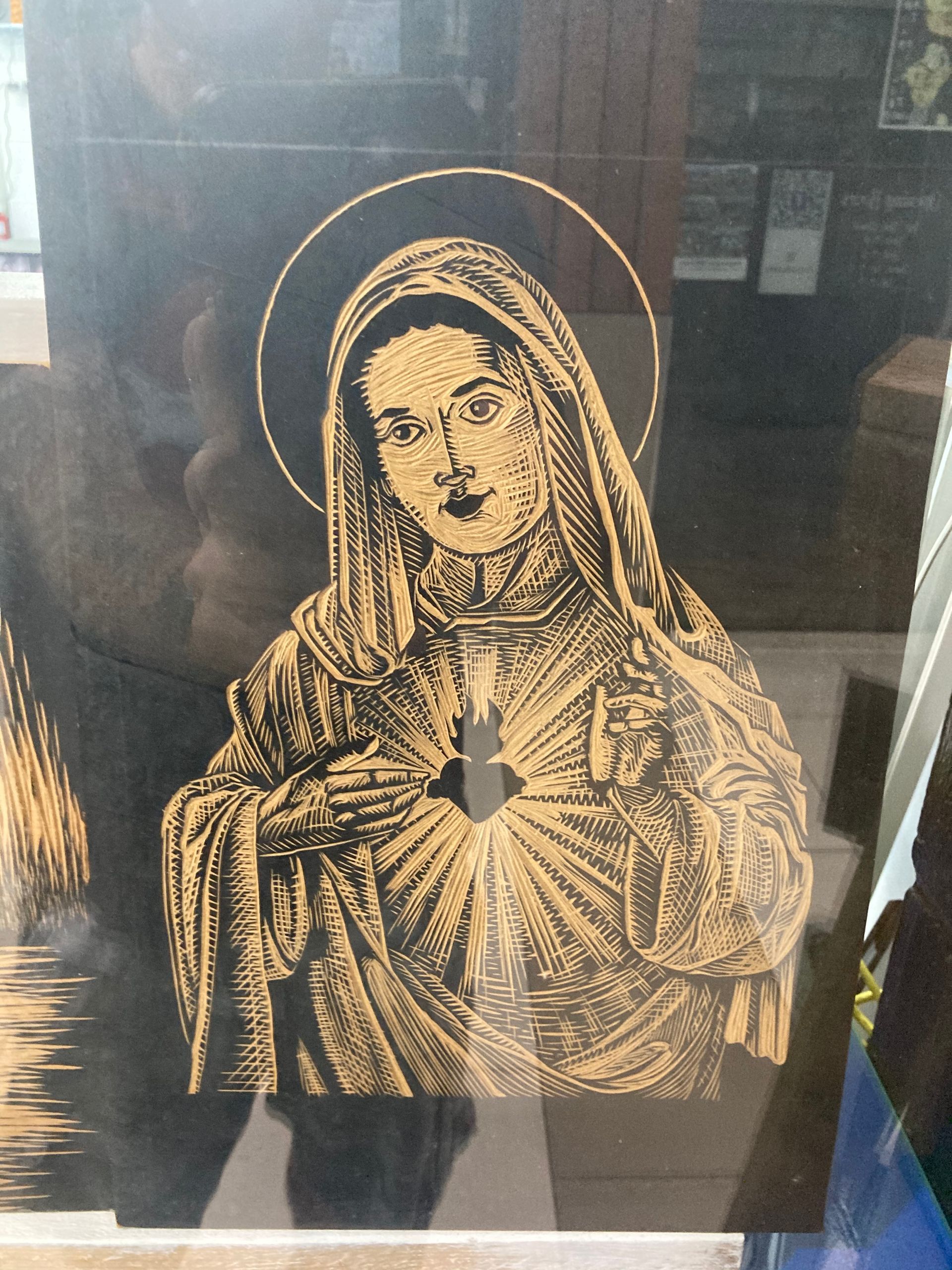 A Painting of a Woman With a Halo Around Her Head — La Bomba Loca Tattoo in Cairns City, QLD