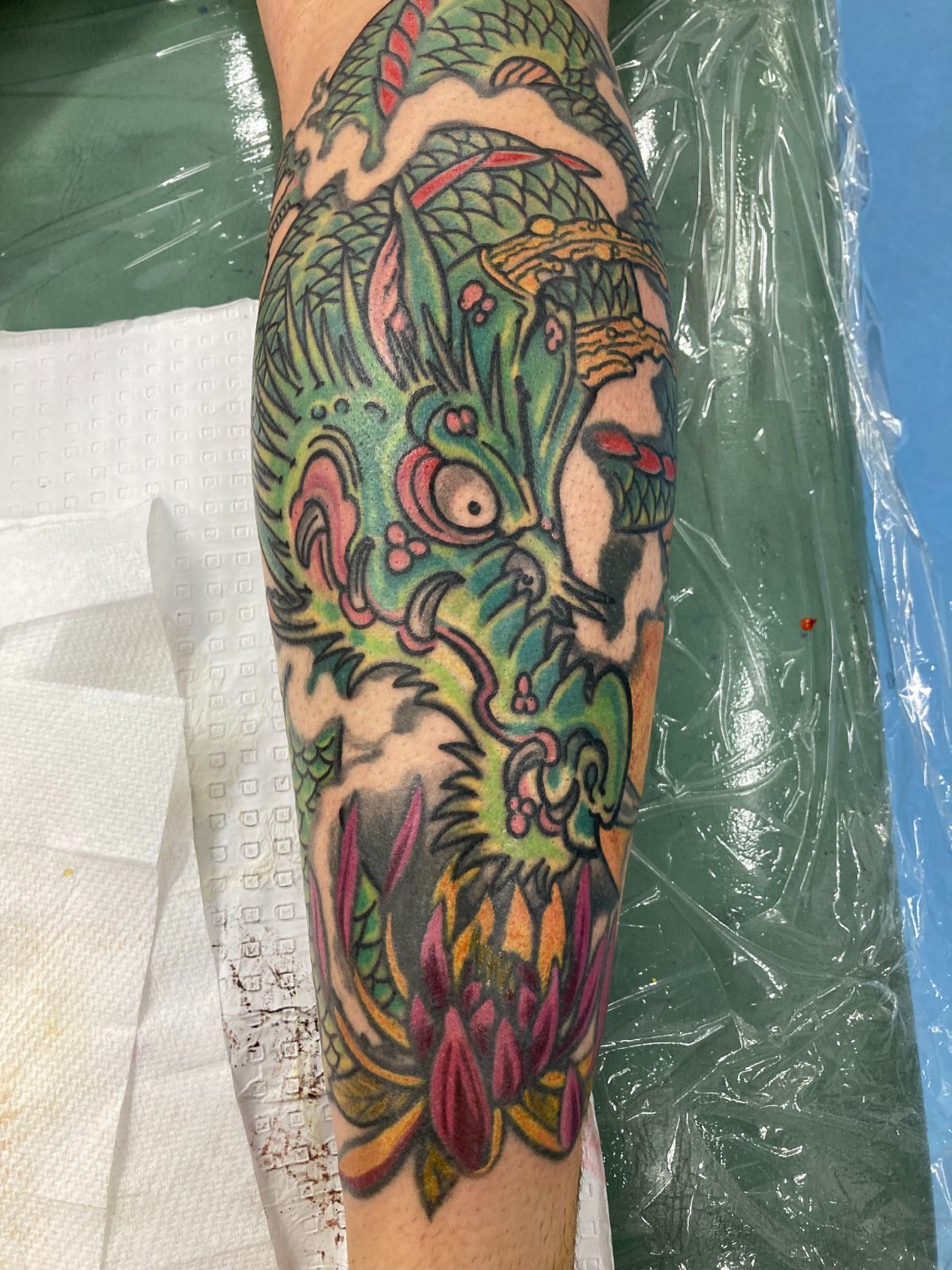 A Man With a Tattoo on His Arm — La Bomba Loca Tattoo in Cairns City, QLD